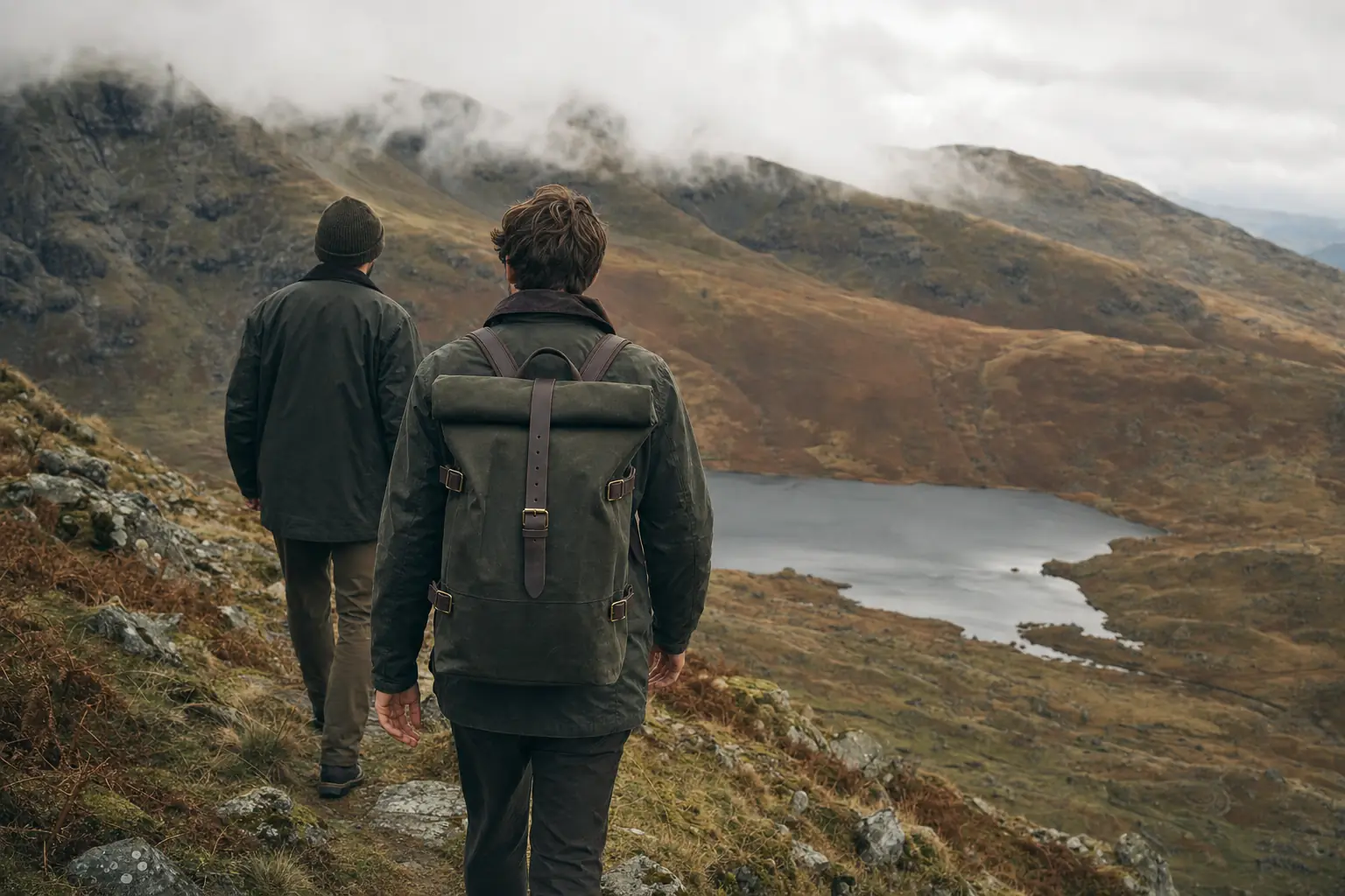 A walker on the fells with a waxed-cotton rolltop